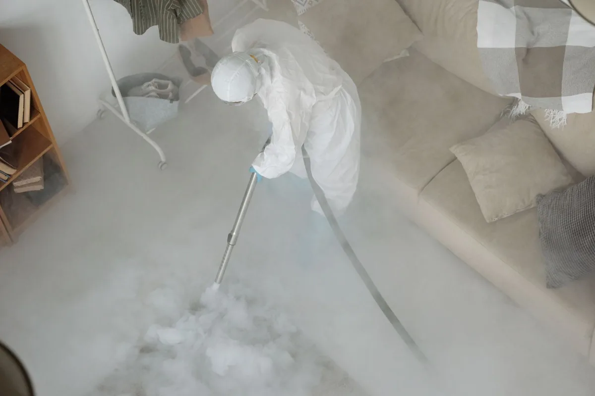Biohazard cleanup technician in protective equipment, Independence, OR